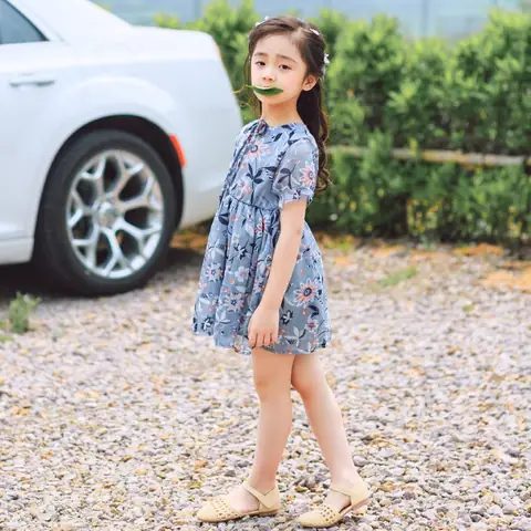 Kiểu Tóc Đẹp Cho Bé Gái 7, 8, 9 Tuổi – Kiểu Tóc Xoăn Cột Nửa Đầu